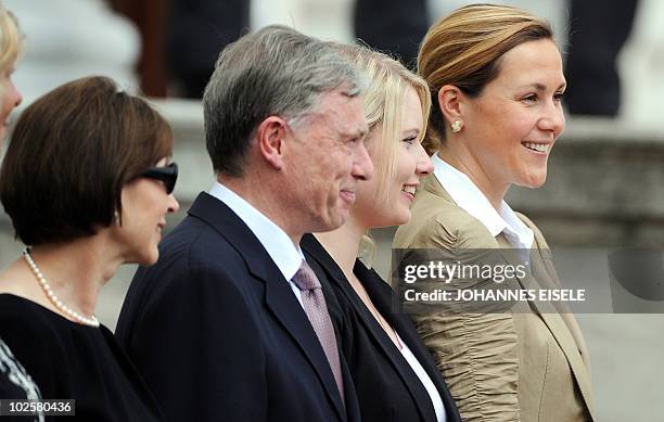 Former German President Horst Koehler , his wife Eva Luise Koehler , Annalena Wulff and Bettina Wulff watch as Germany's new President Christian...