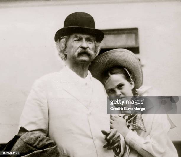 Author Mark Twain standing next to Dorothy Quick , aboard the SS Minnetonka, where they met as Twain was returning from a trip to Oxford University,...