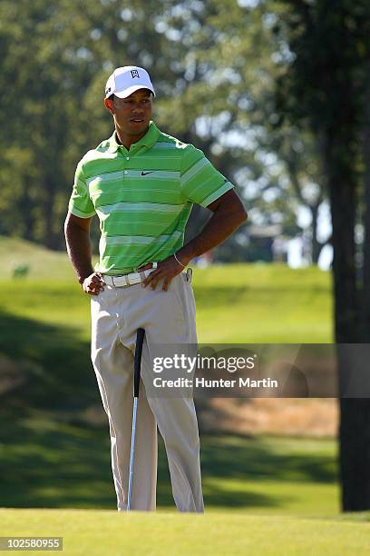 Tiger Woods reacts after he missed a birdie putt attempt on the 10th hole during the second round of the AT&T National at Aronimink Golf Club on July...