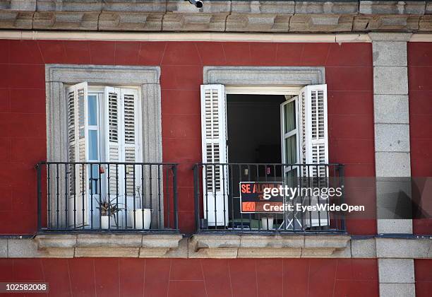 Apartements for rent at Plaza Mayor, the famous central market place which dates back to the 15th century on May 20, 2010 in Madrid, Spain. Madrid is...