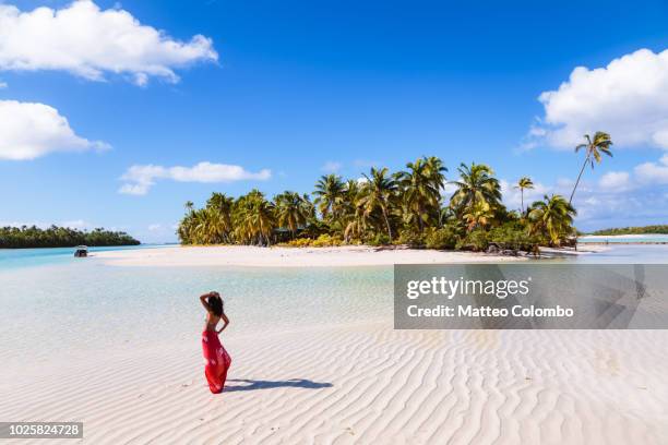 woman on one foot island, aitutaki, cook islands - aitutaki bildbanksfoton och bilder