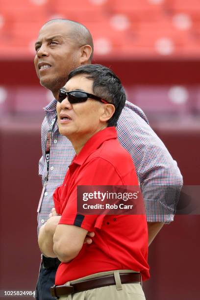 University of Maryland athletic director Damon Evans and university president Wallace Loh watch pregame before the start of the Maryland Terrapins...