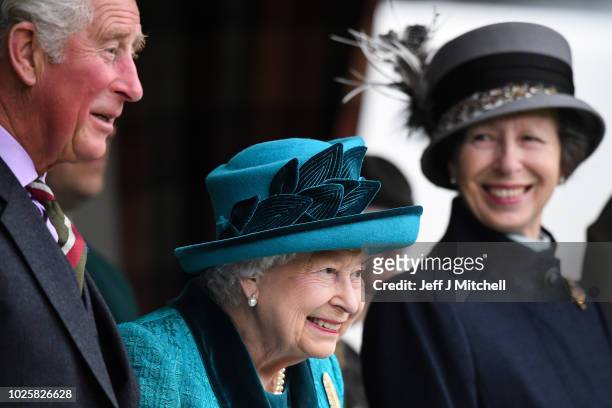 Queen Elizabeth II,Prince Charles, Prince of Wales and Princess Anne attend the annual Braemar Highland Gathering on September 1, 2018 in Braemar,...