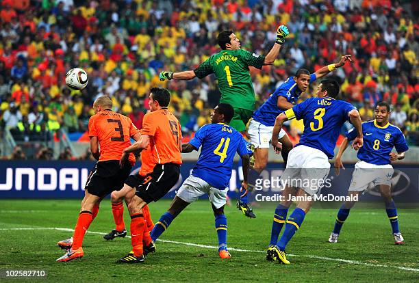 Felipe Melo of Brazil scores an own goal after a cross from Wesley Sneijder of the Netherlands hits his head as goalkeeper Julio Cesar misjudges the...