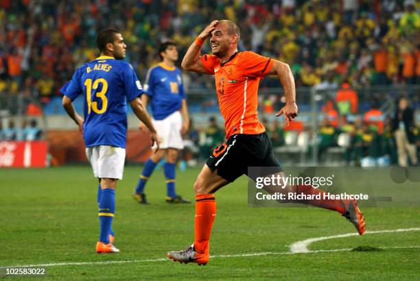 Wesley Sneijder of the Netherlands celebrates scoring his team's second goal during the 2010 FIFA World Cup South Africa Quarter Final match between...