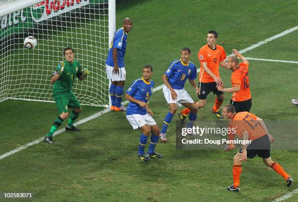 Wesley Sneijder of the Netherlands scores his side's second goal past Julio Cesar of Brazil during the 2010 FIFA World Cup South Africa Quarter Final...