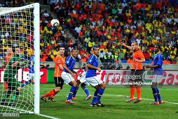 Wesley Sneijder of the Netherlands scores his team's second goal during the 2010 FIFA World Cup South Africa Quarter Final match between Netherlands...