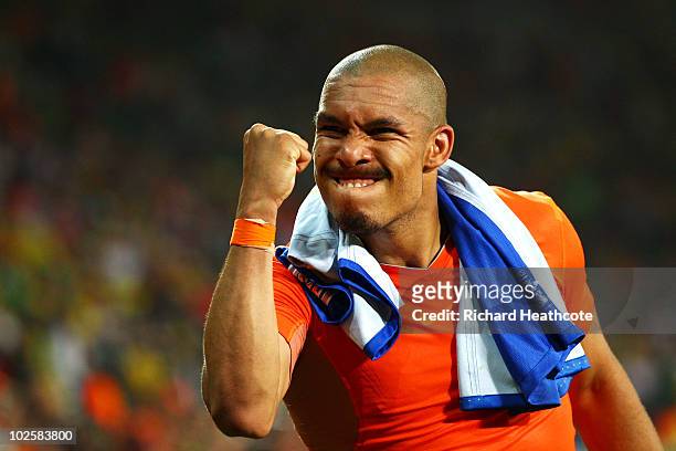 Nigel De Jong of the Netherlands celebrates victory following the 2010 FIFA World Cup South Africa Quarter Final match between Netherlands and Brazil...