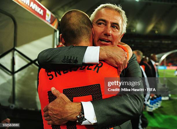 Bert van Marwijk head coach of the Netherlands embraces goalscorer Wesley Sneijder of the Netherlands after the 2010 FIFA World Cup South Africa...