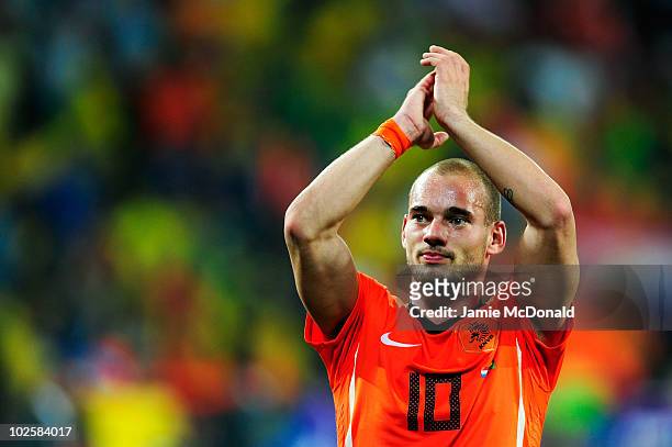 Wesley Sneijder of the Netherlands celebrates victory following the 2010 FIFA World Cup South Africa Quarter Final match between Netherlands and...