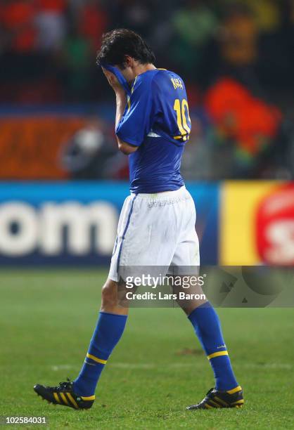 Kaka of Brazil is dejected after being knocked out of the tournament during the 2010 FIFA World Cup South Africa Quarter Final match between...
