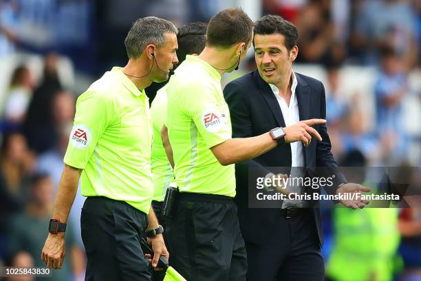 Everton manager Marco Silva complains to referee Stuart Attwell at full-time following the Premier League match between Everton FC and Huddersfield...