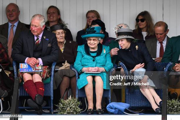 Queen Elizabeth II, The Duke of Rothesay and Princess Anne attend the annual Braemar Highland Gathering on September 1, 2018 in Braemar, Scotland....