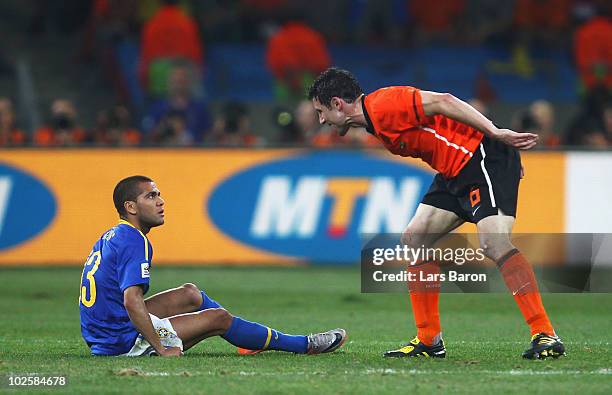 Mark Van Bommel shouts at Dani Alves of Brazil during the 2010 FIFA World Cup South Africa Quarter Final match between Netherlands and Brazil at...