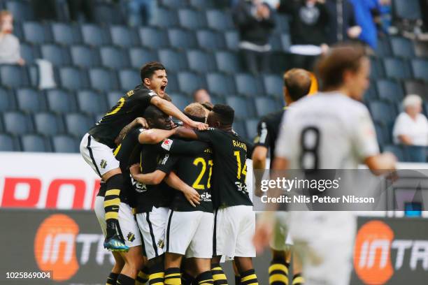 Players of AIK celebrates since Joel Ekstrand of AIK has scored the opening goal to 1-0 during the Allsvenskan match between AIK and BK Hacken at...