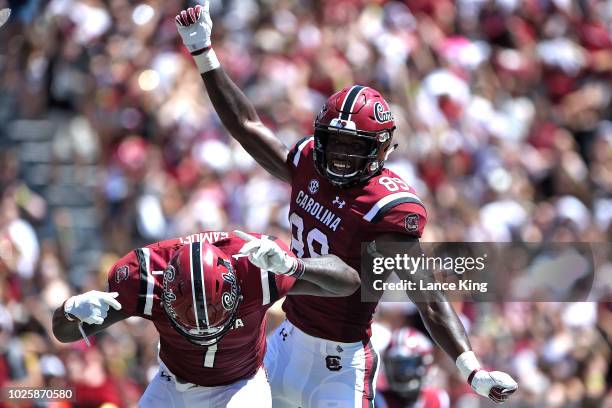 Bryan Edwards and Deebo Samuel of the South Carolina Gamecocks celebrate following a touchdown reception by Edwards during their game against the...