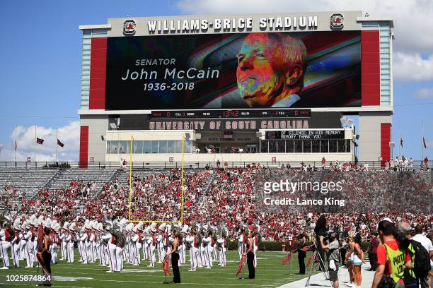 General view as fans pause for a moment of silence for the late US Senator John McCain prior to the game between the Coastal Carolina Chanticleers...