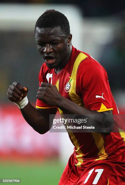 Sulley Muntari of Ghana celebrates scoring the opening goal with team mates during the 2010 FIFA World Cup South Africa Quarter Final match between...