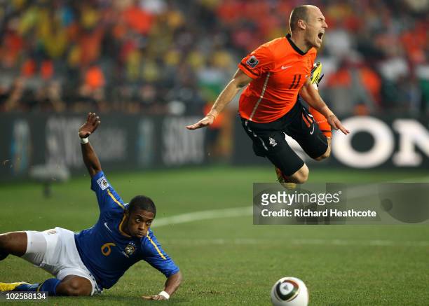 Arjen Robben of The Netherlands dives over the tackle of Michel Bastos of Brazil during the 2010 FIFA World Cup South Africa Quarter Final match...
