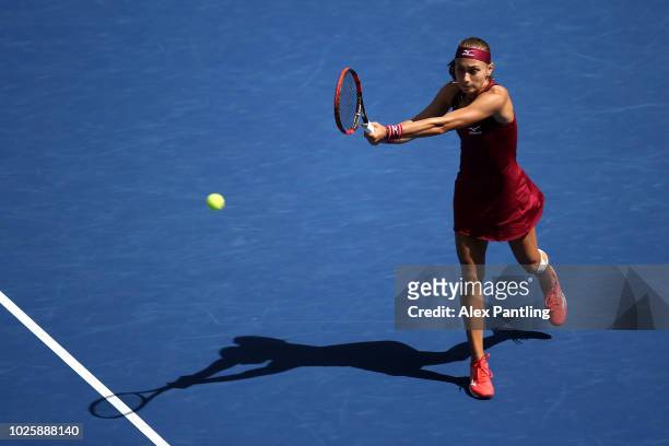 Aleksandra Krunic of Serbia returns the ball during her women's singles third round match against Madison Keys of the United States on Day Six of the...