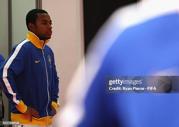 Robinho of Brazil looks on from the tunnel ahead of the 2010 FIFA World Cup South Africa Quarter Final match between Netherlands and Brazil at Nelson...