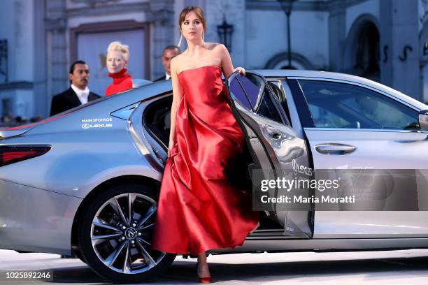 Dakota Johnson walks the red carpet ahead of the 'Suspiria' screening during the 75th Venice Film Festival at Sala Grande on September 1, 2018 in...