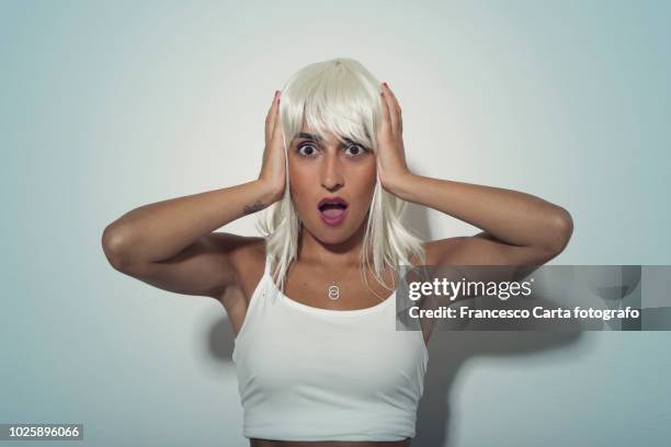 surprise - blond wig stock pictures, royalty-free photos & images