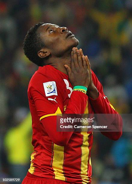 Asamoah Gyan of Ghana gestures in frustration during the 2010 FIFA World Cup South Africa Quarter Final match between Uruguay and Ghana at the Soccer...