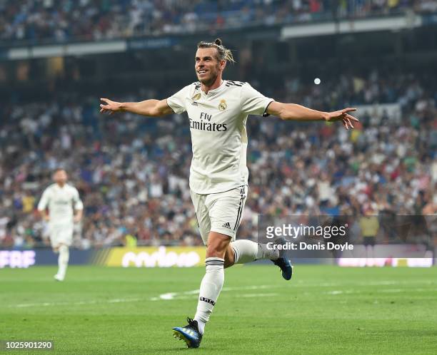 Gareth Bale of Real Madrid celebrates after scoring his team's opening goal during the La Liga match between Real Madrid CF and CD Leganes at Estadio...