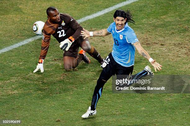 Sebastian Abreu of Uruguay celebrates scoring the winning penalty, past Richard Kingson of Ghana, in a penalty shoot out during the 2010 FIFA World...