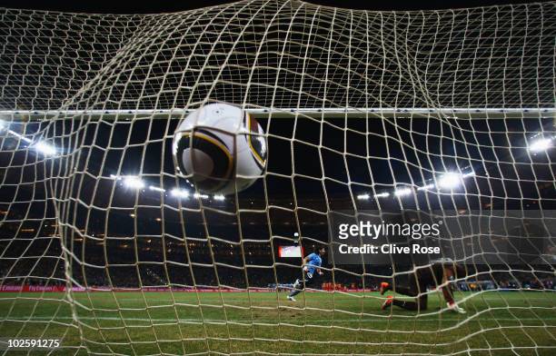 Sebastian Abreu of Uruguay scores the winning penalty, past Richard Kingson of Ghana, in a penalty shoot out during the 2010 FIFA World Cup South...