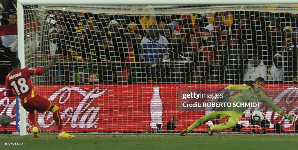 Ghana's striker Dominic Adiyiah (L) miss