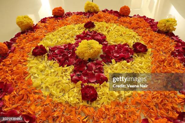 onam pookalam/flower carpet/kerala - pookalam stock pictures, royalty-free photos & images