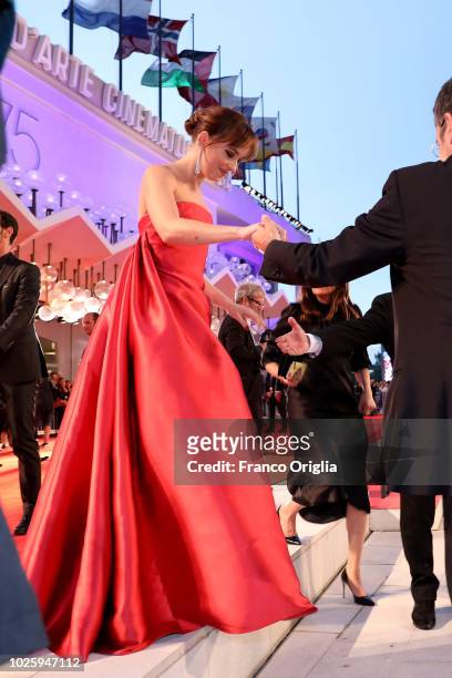 Dakota Johnson walks the red carpet ahead of the 'Suspiria' screening during the 75th Venice Film Festival at Sala Grande on September 1, 2018 in...