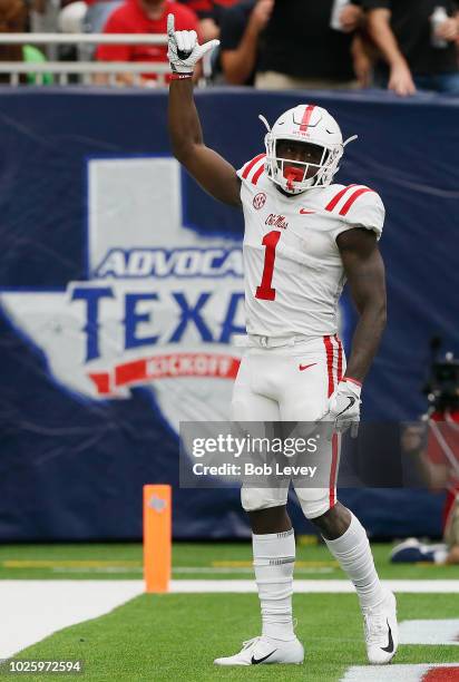 Brown of the Mississippi Rebels celebrates after scoring on a 34 yard pass and run in the fourth quarter against the Texas Tech Red Raiders at NRG...