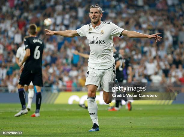 Gareth Bale of Real Madrid celebrates after scoring the opening goal during the La Liga match between Real Madrid and CD Leganes at Estadio Santiago...