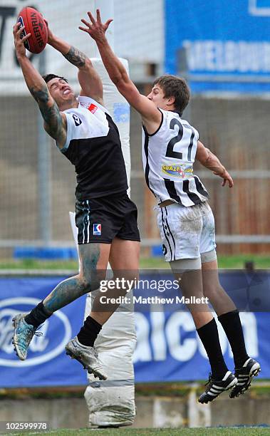 Aaron Edwards of North Ballarat marks during the round 11 VFL match between Collingwood and North Ballarat at Victoria Park on July 3, 2010 in...