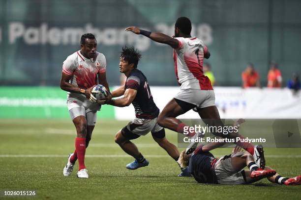 Japan compete against Hong Kong during the Men's Rugby Sevens Gold Medal Match between Japan and Hong Kong on day fourteen of the Asian Games on...