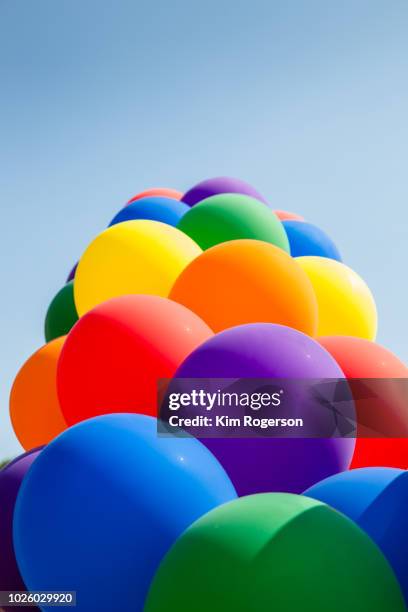 pride rainbow ballons arch vertical - respect background stock pictures, royalty-free photos & images