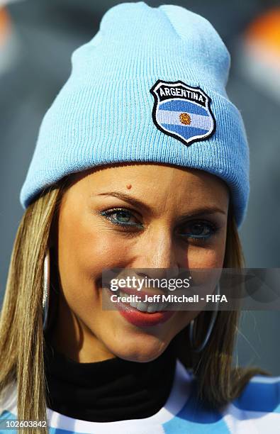 An Argentina fan enjoys the atmosphere ahead of the 2010 FIFA World Cup South Africa Quarter Final match between Argentina and Germany at Green Point...