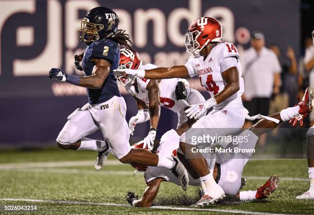 Anthony Jones of the FIU Golden Panthers scores for a touchdown during the first half against the Indiana Hoosiers at Ricardo Silva Stadium on...