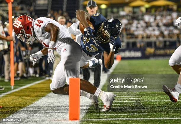 Napoleon Maxwell of the FIU Golden Panthers dives for the end zone during the second half against the Indiana Hoosiers at Ricardo Silva Stadium on...