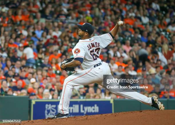 Houston Astros starting pitcher Josh James pitches to Los Angeles Angels first baseman Jose Fernandez during the baseball game between the Los...