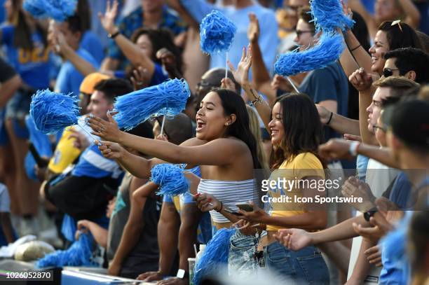 Student fans cheer on the team during a college football game between the Cincinnati Bearcats and the UCLA Bruins on September 01 at the Rose Bowl in...