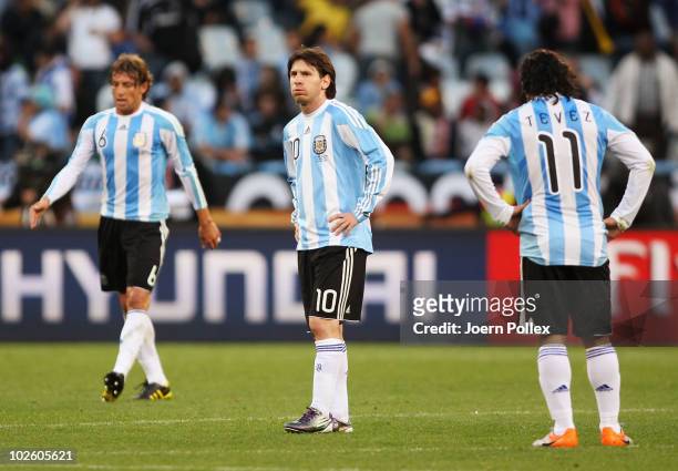 Lionel Messi of Argentina looks frustrated as he prepares to restart the match during the 2010 FIFA World Cup South Africa Quarter Final match...