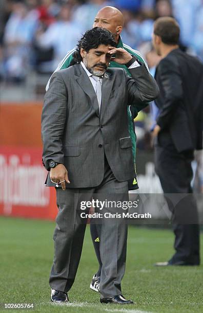 Diego Maradona head coach of Argentina looks frustrated during the 2010 FIFA World Cup South Africa Quarter Final match between Argentina and Germany...
