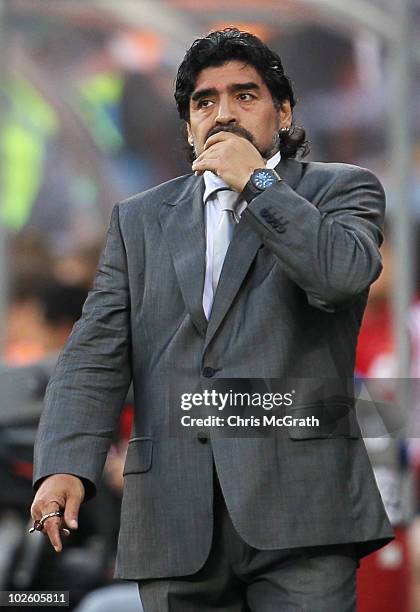 Diego Maradona head coach of Argentina looks thoughtful on the touchline during the 2010 FIFA World Cup South Africa Quarter Final match between...