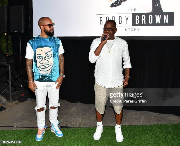 Kenny Burns and Bobby Brown onstage during The "Bobby-Q" Atlanta Premiere Of "The Bobby Brown Story" at Atlanta Contemporary Arts Center on September...