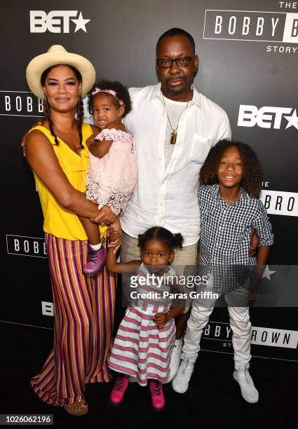 Singer Bobby Brown pose with his family members Alicia Etheredge-Brown , Bodhi Brown, Hendrix Brown, and Cassius Brown at The "Bobby-Q" Atlanta...
