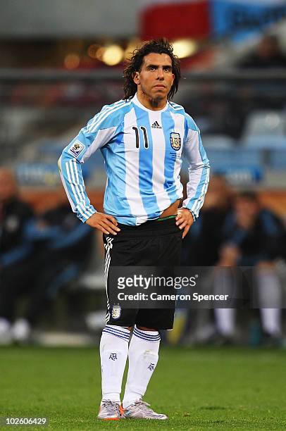 Carlos Tevez of Argentina looks dejected during the 2010 FIFA World Cup South Africa Quarter Final match between Argentina and Germany at Green Point...